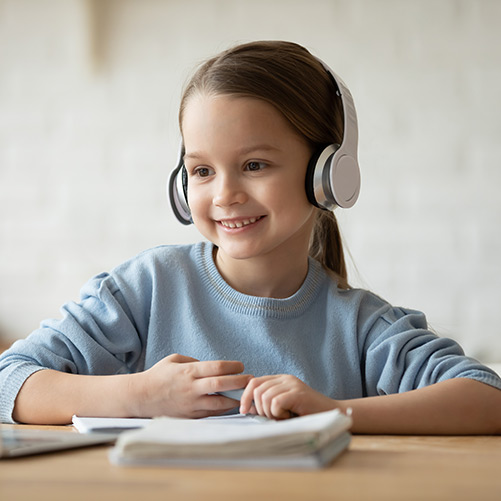 Young girl participating in online speech therapy