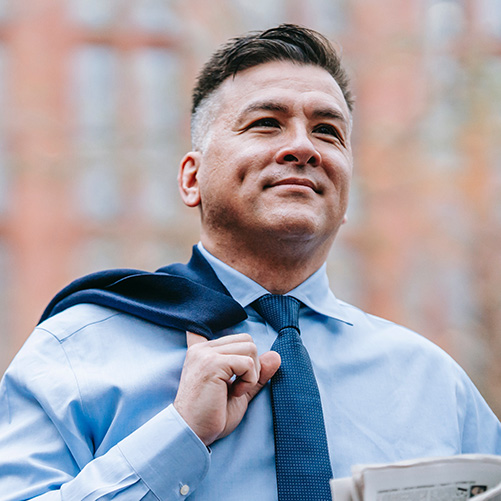 Confident Accent Modification Graduating Professional standing with jacket over shoulder