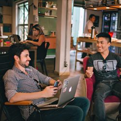 Two men practicing american accent Two men practicing american accent in a coffee shop.jpg